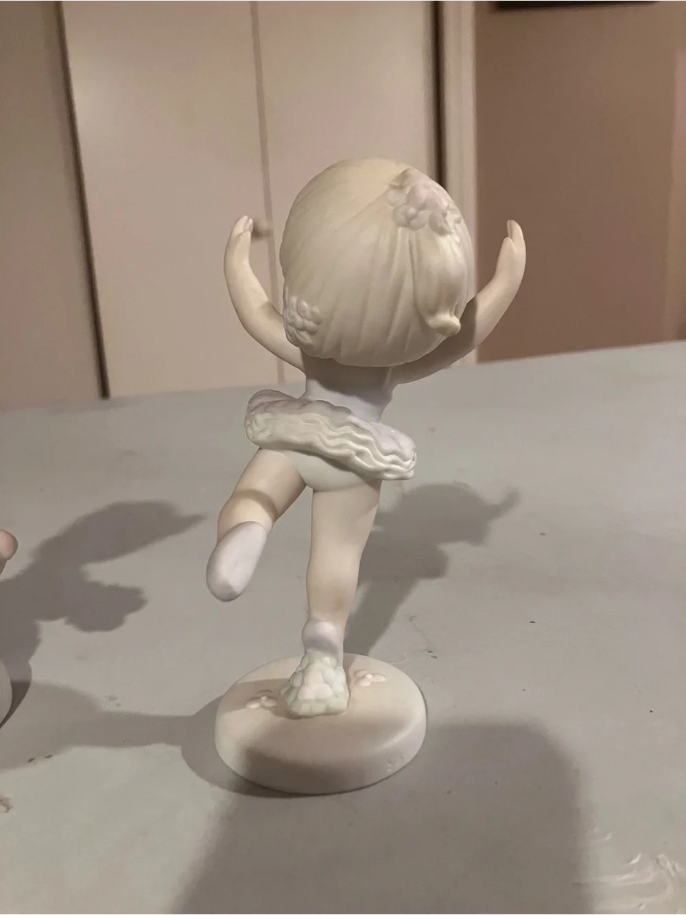 Precious Moments Cream and Light Blue Balancing Child Figurine